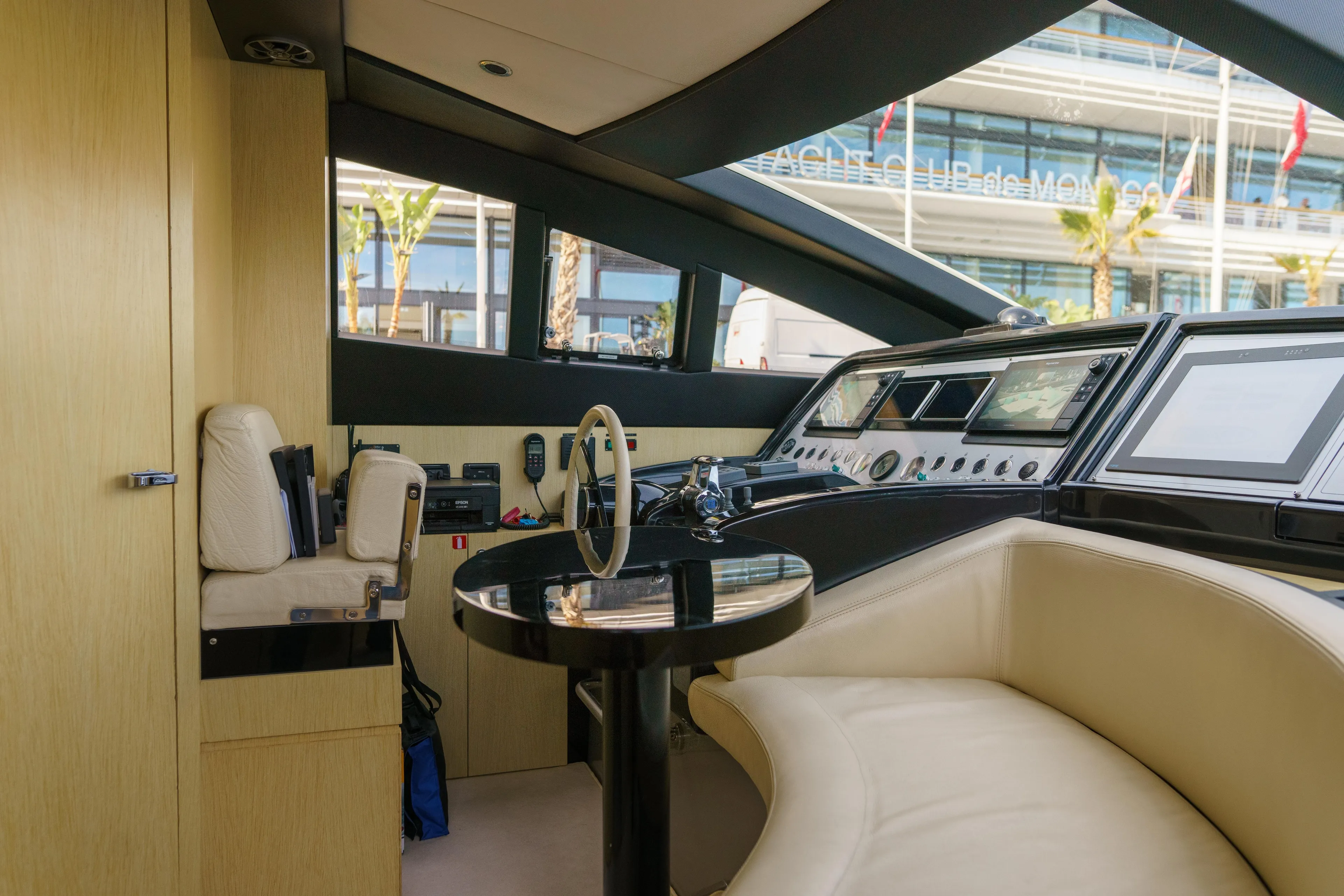 Milky Way Yacht Photos Pics Interior of 2007 Riva Venere 75 yacht, featuring modern helm and luxurious seating.