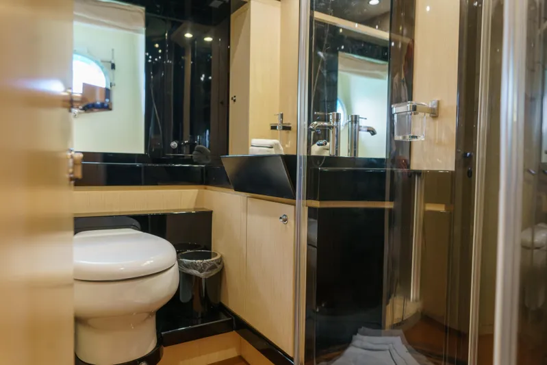Milky Way Yacht Photos Pics Luxurious bathroom interior of 2007 Riva Venere 75 yacht, featuring modern fixtures and elegant design.