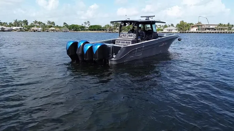  Yacht Photos Pics 2016 Hydra-Sports 4200 Siesta boat with four engines on calm water.