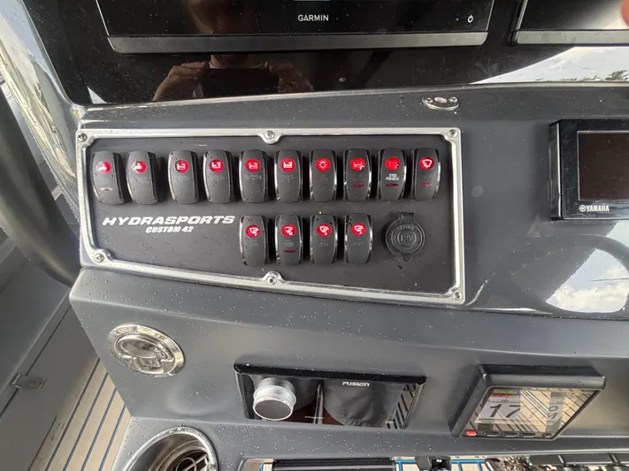  Yacht Photos Pics Control panel of 2016 Hydra-Sports 4200 Siesta boat with switches and displays.