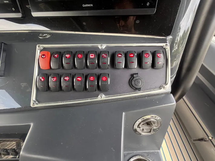  Yacht Photos Pics Control panel of a 2016 Hydra-Sports 4200 Siesta boat with labeled switches.