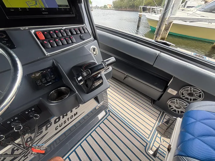  Yacht Photos Pics 2016 Hydra-Sports 4200 Siesta boat interior with control panel and seating.