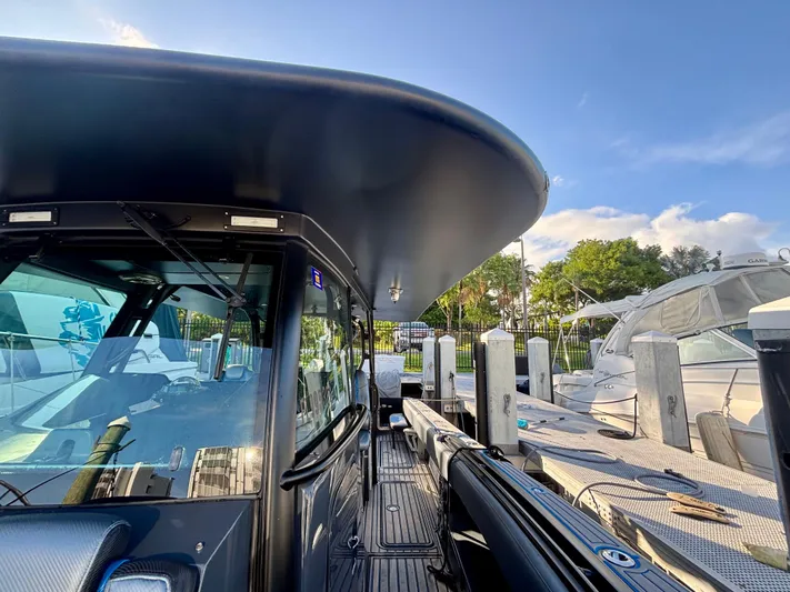  Yacht Photos Pics 2016 Hydra-Sports 4200 Siesta boat docked, showcasing sleek design and modern features.