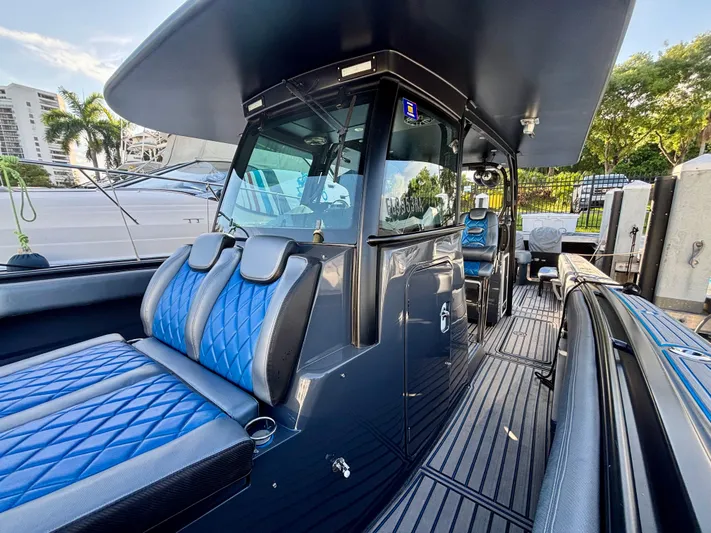  Yacht Photos Pics 2016 Hydra-Sports 4200 Siesta boat interior with blue seating and sleek design.