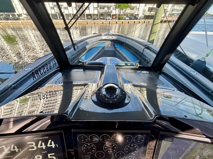  Yacht Photos Pics 2016 Hydra-Sports 4200 Siesta boat dashboard with navigation instruments and waterfront view.