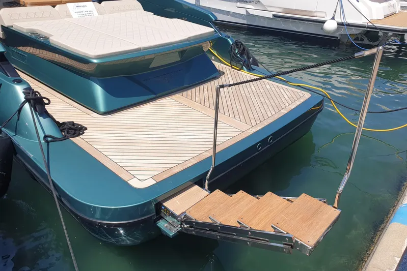  Yacht Photos Pics 2023 Canados Gladiator 493 yacht with teak deck and retractable boarding stairs.