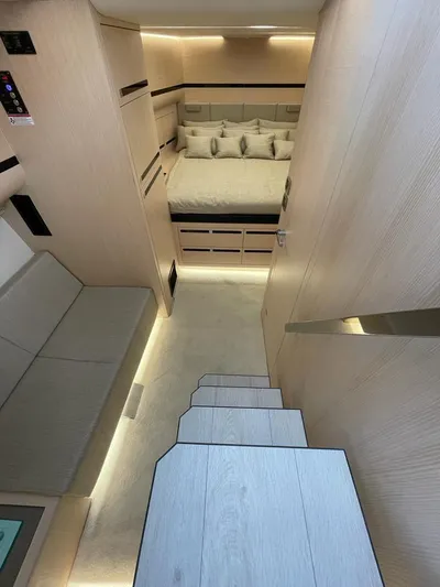  Yacht Photos Pics Luxurious interior of 2023 MedYacht 42, featuring modern design and cozy sleeping area.