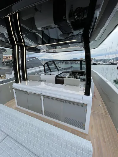  Yacht Photos Pics Luxurious 2023 MedYacht 42 interior with sleek design and modern amenities at a marina.