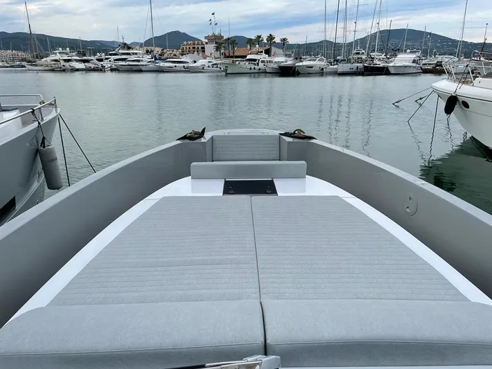  Yacht Photos Pics MedYacht 42, 2023 model, docked in a marina with scenic mountain backdrop.