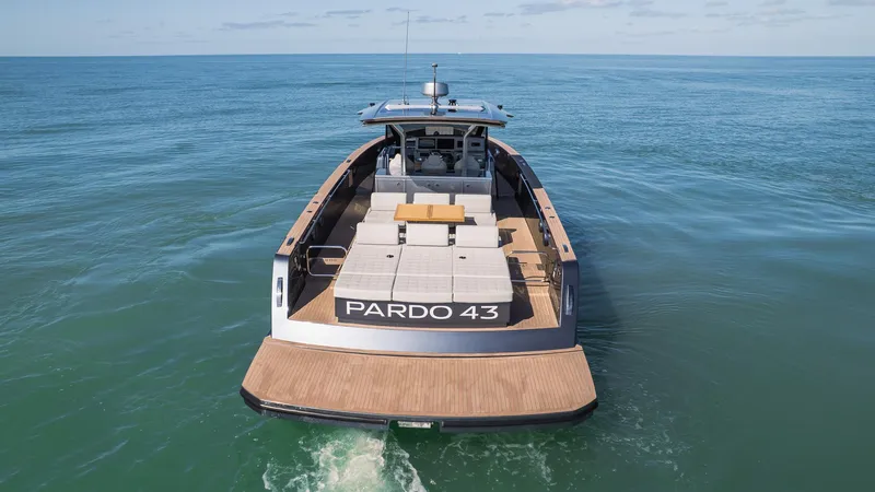  Yacht Photos Pics 2025 Pardo Yachts 43 cruising on open sea, showcasing sleek design and spacious deck.