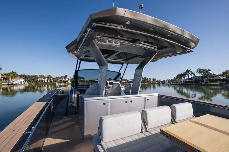  Yacht Photos Pics 2025 Pardo Yachts 43 on serene waterway, showcasing sleek design and luxury features.