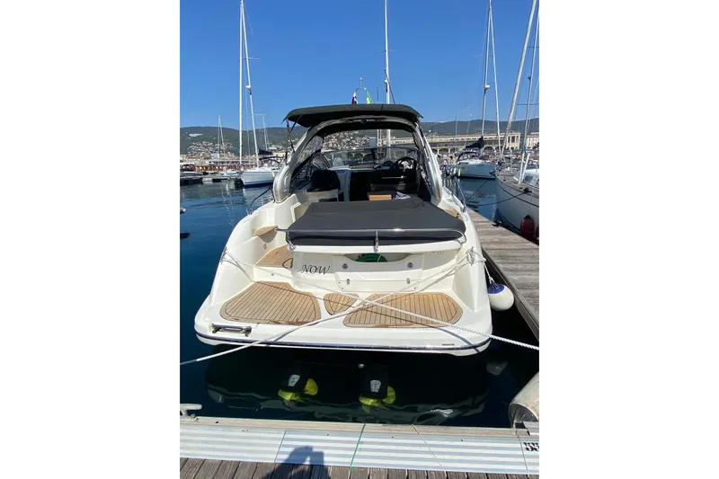  Yacht Photos Pics 2009 Cranchi Endurance 33 yacht docked at a marina, rear view.