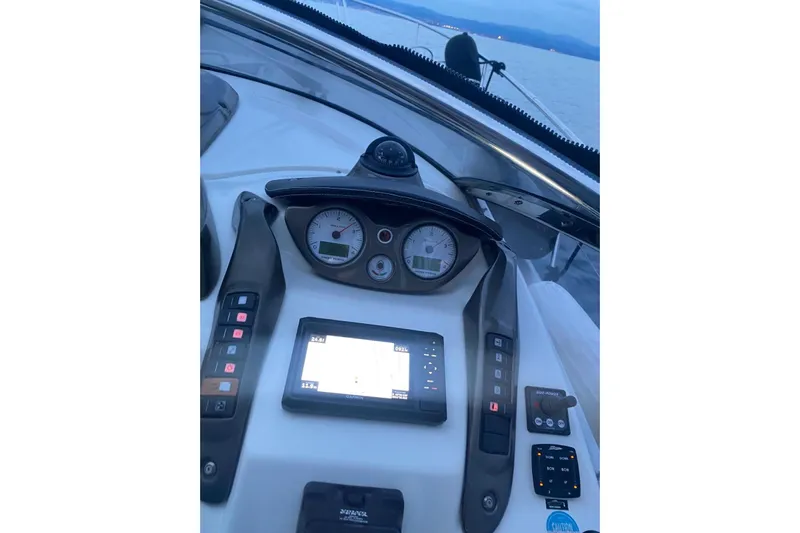  Yacht Photos Pics Control panel of 2009 Cranchi Endurance 33 boat with navigation display.