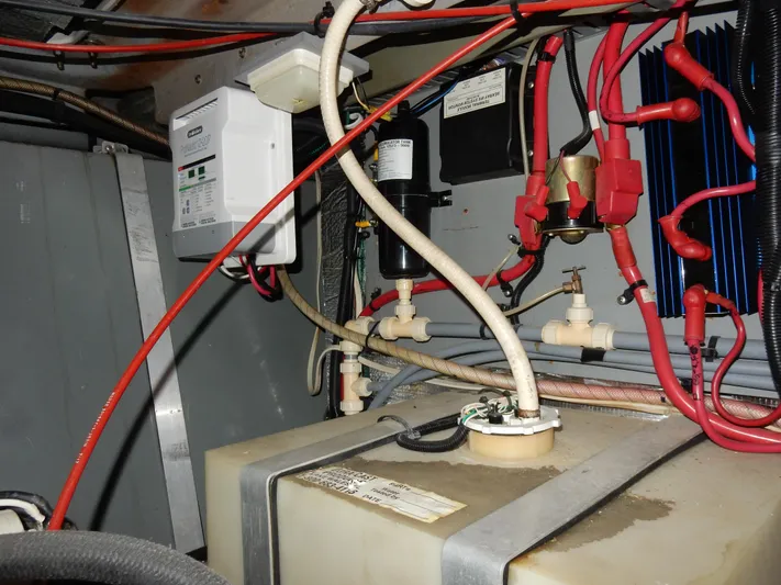 Sandi Yacht Photos Pics Engine compartment of a 1997 Sea Ray 450, showing wiring and components.