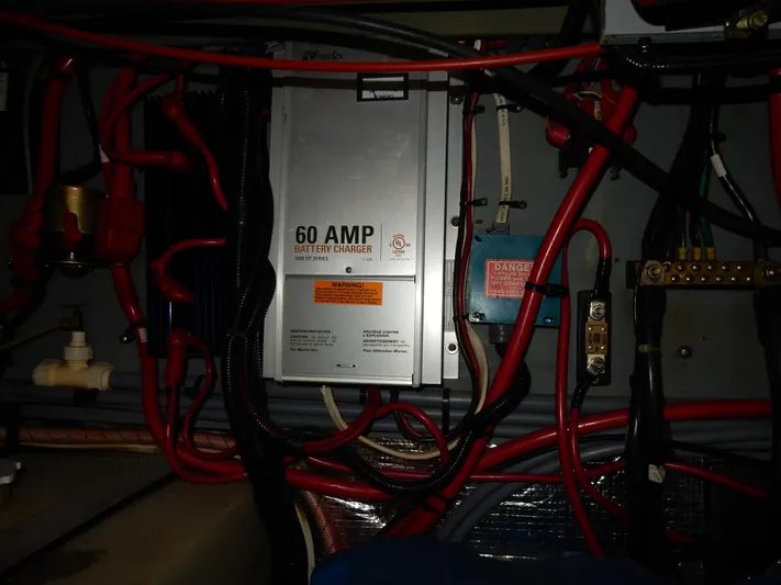Sandi Yacht Photos Pics Electrical system of a 1997 Sea Ray 450, featuring a 60 AMP battery charger.