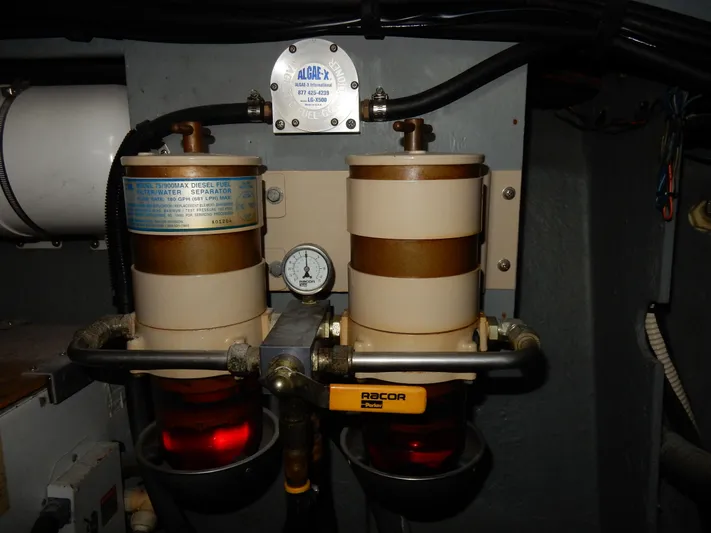 Sandi Yacht Photos Pics Engine room components of a 1997 Sea Ray 450, featuring dual fuel filters.