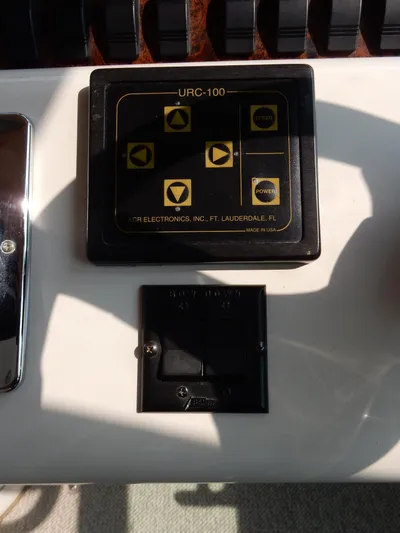 Sandi Yacht Photos Pics Control panel on a 1997 Sea Ray 450 boat, featuring URC-100 interface.