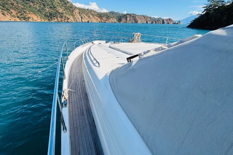  Yacht Photos Pics Luxury yacht Princess 21M (2007) cruising in scenic coastal waters.