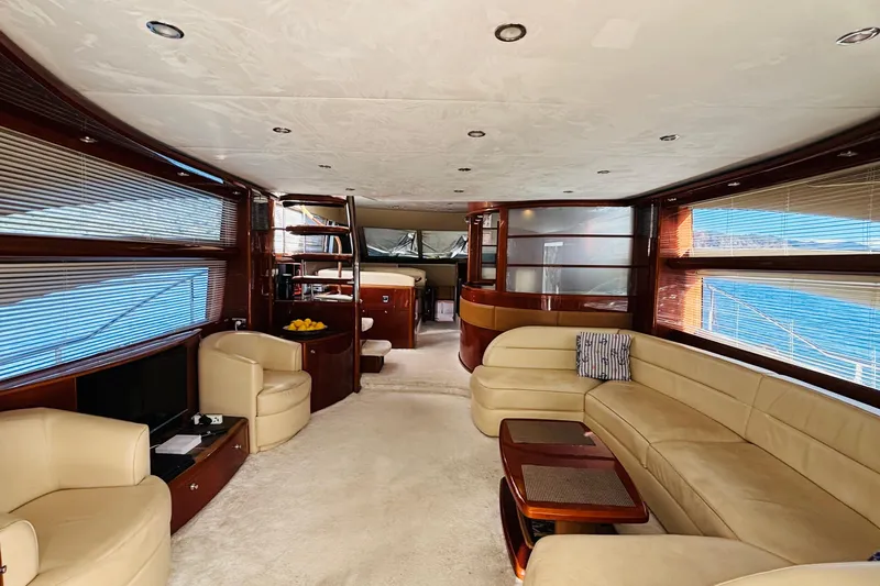  Yacht Photos Pics Luxurious interior of 2007 Princess 21M yacht with elegant seating and modern design.