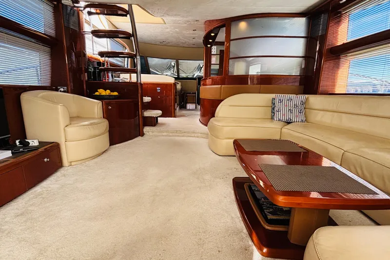  Yacht Photos Pics Luxurious interior of a 2007 Princess 21M yacht with elegant seating and modern design.