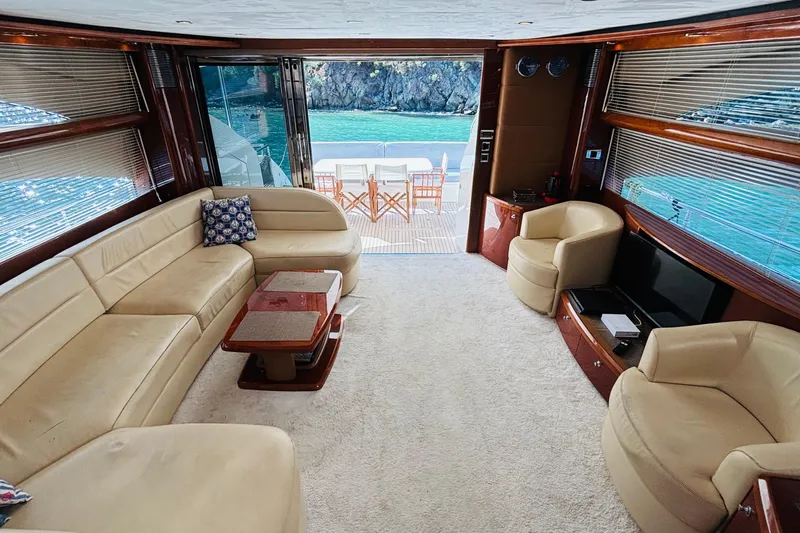  Yacht Photos Pics Luxurious interior of 2007 Princess 21M yacht with elegant seating and ocean view.