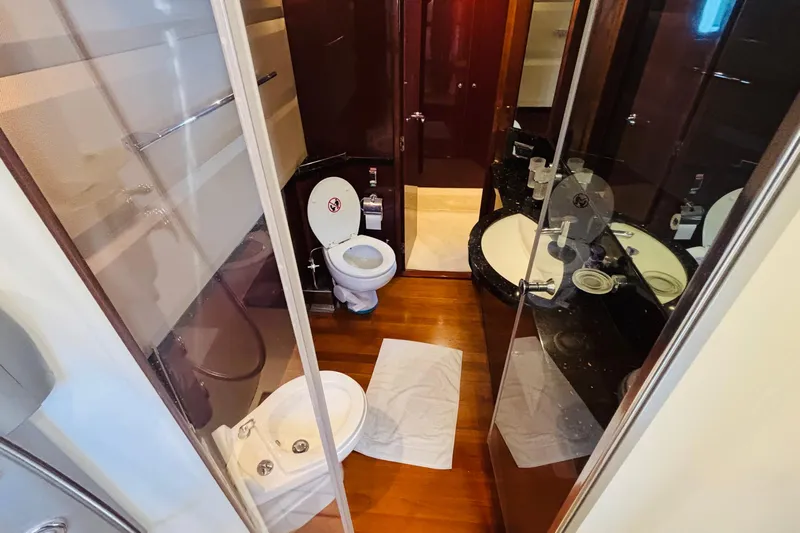  Yacht Photos Pics Luxurious yacht bathroom with shower, toilet, and sink; Princess 21M, 2007 model.