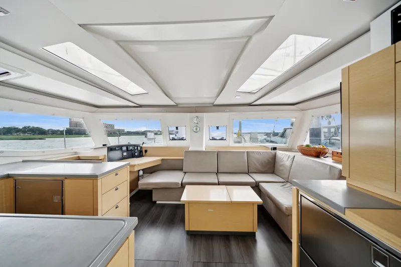 Starry Night Yacht Photos Pics Spacious interior of 2014 Fountaine Pajot Helia 44 catamaran with modern furnishings.