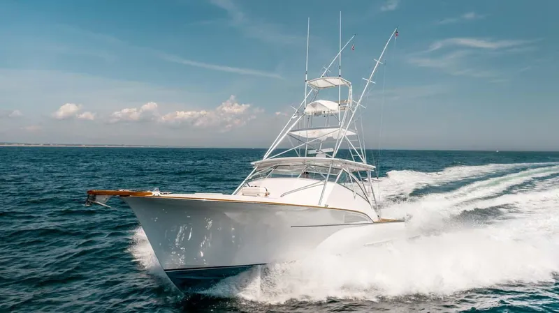  Yacht Photos Pics 1993 Buddy Davis Express Custom Carolina yacht cruising on open sea.