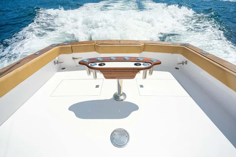  Yacht Photos Pics 1993 Buddy Davis Express Custom Carolina boat deck with ocean view and wake.