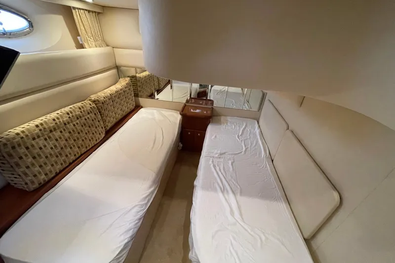  Yacht Photos Pics 2005 Silverton 43 Sport Bridge cabin with twin beds and elegant interior design.