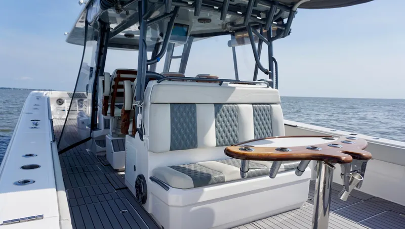  Yacht Photos Pics 2022 Invincible 46 Catamaran interior with seating and ocean view.