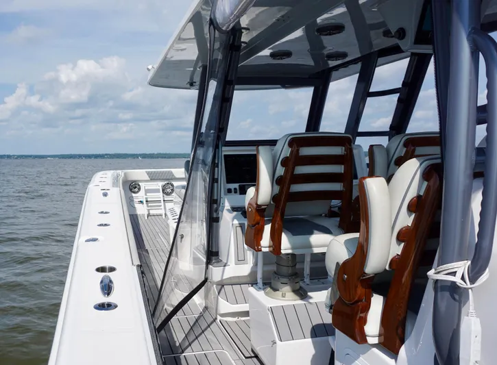 Yacht Photos Pics 2022 Invincible 46 Catamaran interior with luxurious seating and ocean view.
