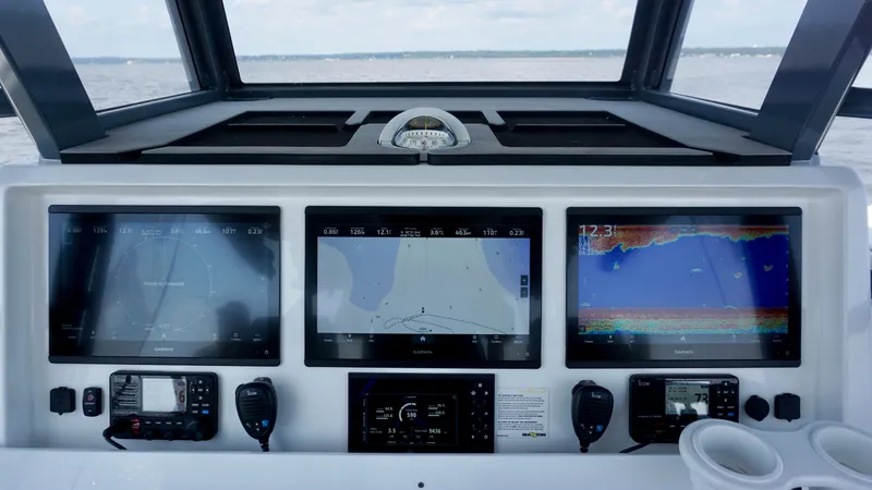  Yacht Photos Pics Invincible 46 Catamaran 2022 dashboard with advanced navigation and communication systems.