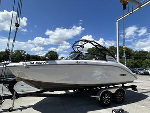 2023 Yamaha Boats 222 SD on trailer under blue sky.