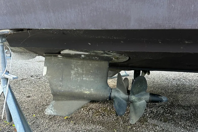  Yacht Photos Pics 2006 Cruisers Yachts 420 Express propeller and hull detail on dry dock.