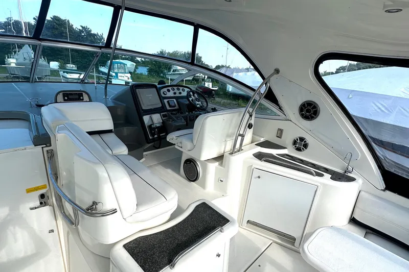  Yacht Photos Pics 2006 Cruisers Yachts 420 Express cockpit with modern controls and seating.