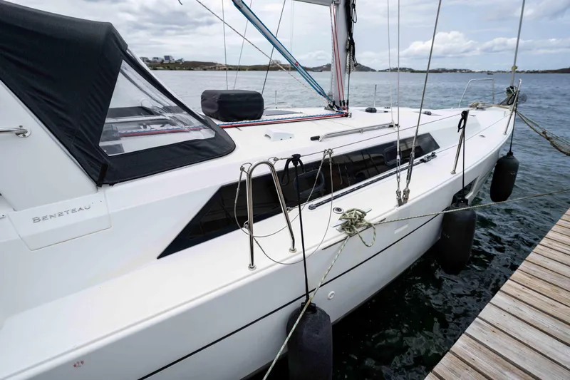 Orion Yacht Photos Pics 2017 Beneteau Oceanis 41.1 sailboat docked by the water.