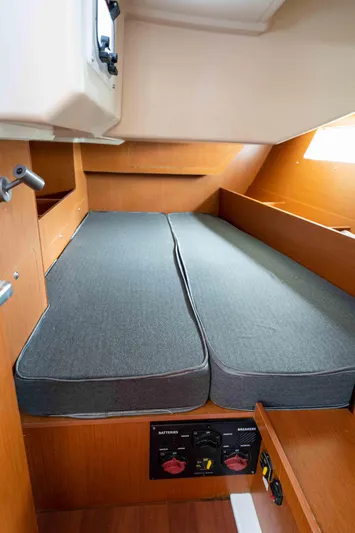 Orion Yacht Photos Pics 2017 Beneteau Oceanis 41.1 cabin with twin beds and wooden interior.