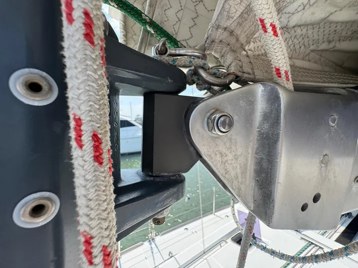 Halcyon Yacht Photos Pics Close-up of Beneteau Oceanis 48 sail rigging, showcasing detailed hardware and ropes.