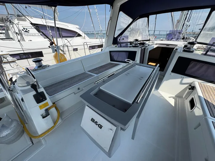 Halcyon Yacht Photos Pics Cockpit of 2017 Beneteau Oceanis 48 sailboat with modern navigation equipment.