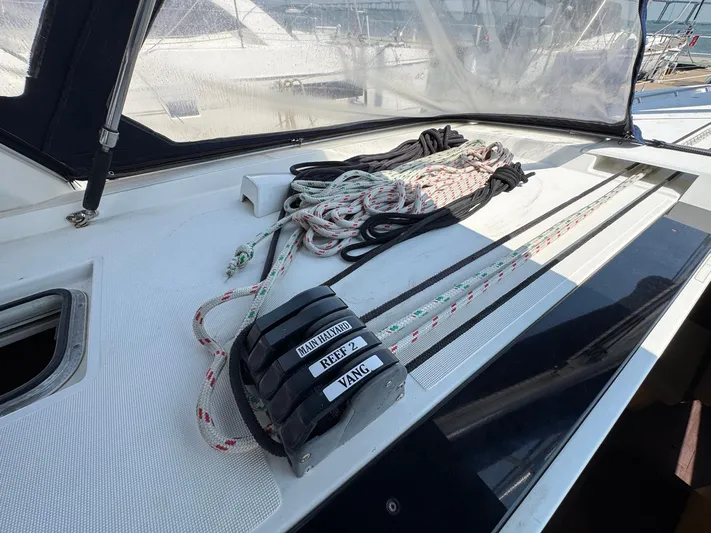 Halcyon Yacht Photos Pics Beneteau Oceanis 48 sailboat deck with ropes and cleats, 2017 model.