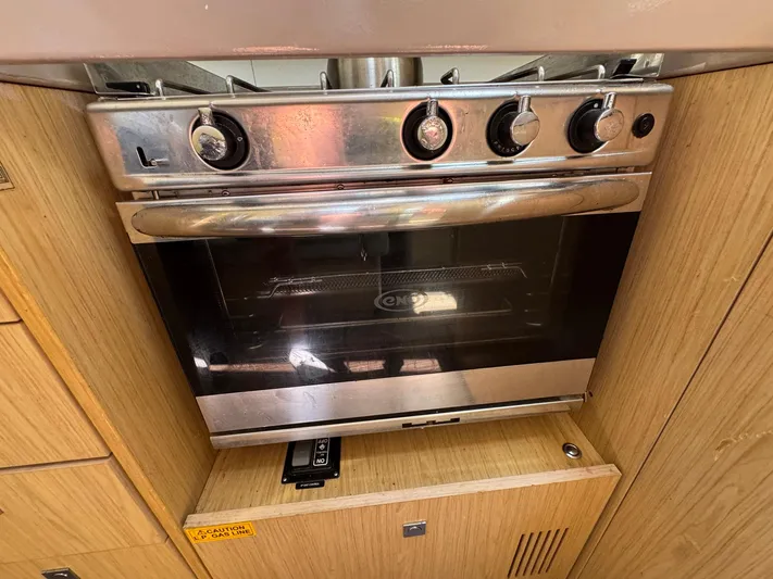 Halcyon Yacht Photos Pics Stainless steel oven in 2017 Beneteau Oceanis 48 yacht kitchen.