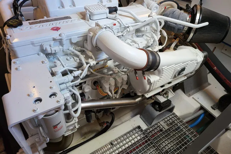  Yacht Photos Pics Engine of a 2019 Prestige 590 yacht, showcasing intricate mechanical components.