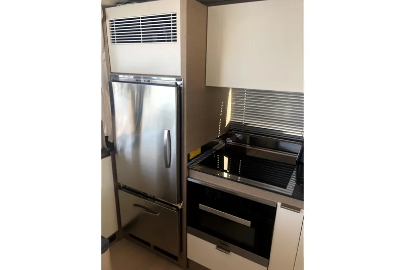  Yacht Photos Pics Modern kitchen in 2019 Prestige 590 yacht with stainless steel appliances.