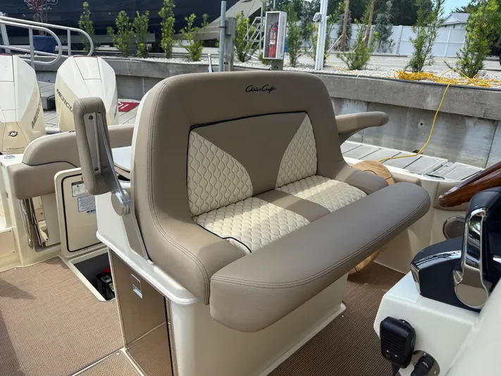  Yacht Photos Pics 2025 Chris-Craft Catalina 28 boat interior with luxurious seating and modern design.