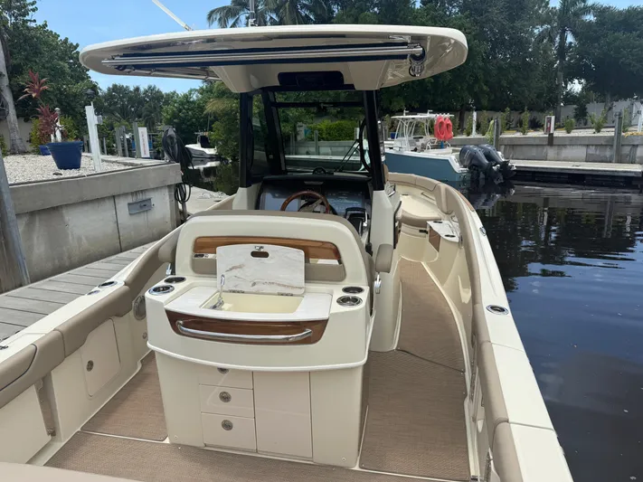  Yacht Photos Pics 2025 Chris-Craft Catalina 28 boat docked, featuring sleek design and modern amenities.