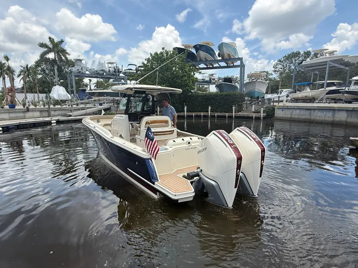  Yacht Photos Pics 2025 Chris-Craft Catalina 28 boat with dual Mercury engines on a sunny day.