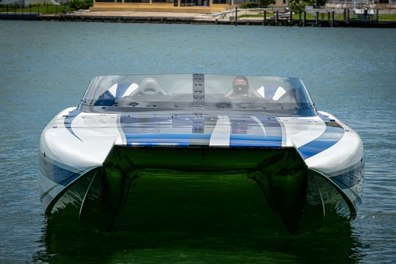  Yacht Photos Pics 2023 Performance Powerboats P360 on water, showcasing sleek design and vibrant graphics.