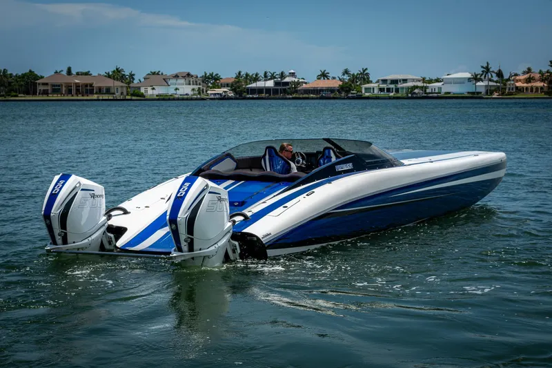  Yacht Photos Pics 2023 Performance Powerboats P360 on water, featuring dual outboard engines.
