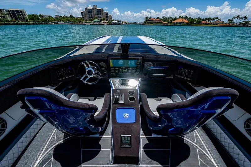  Yacht Photos Pics 2023 Performance Powerboats P360 cockpit with dual seats, advanced controls, and scenic water view.